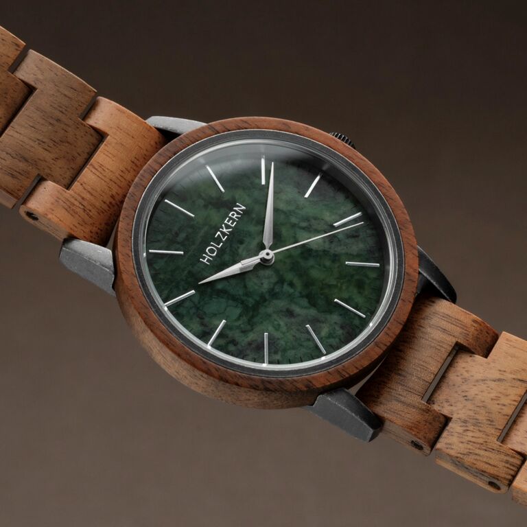 "Bob", a stylish wooden watch with a green marble dial, showcasing a blend of natural elegance and craftsmanship.